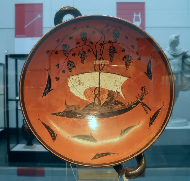 Black figure Kylix (drinking cup) depicting Dionysus ...
